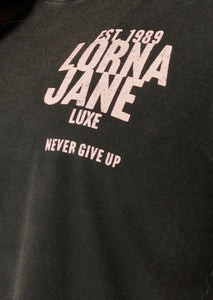 ﾛｰﾅ 062581 ﾍﾘﾃｲｼﾞ ﾘﾗｯｸｽﾄﾞ Tｼｬﾂ（WashedBlack）