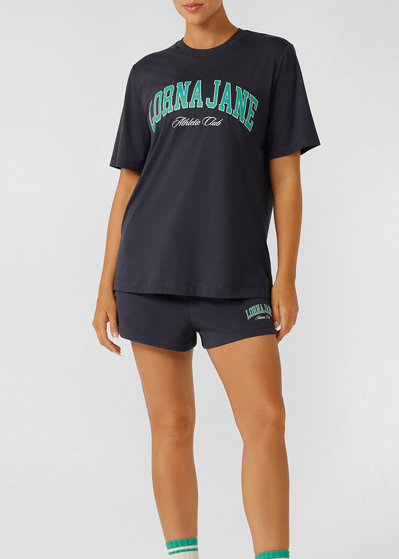 ﾗｽﾄ1点 ﾛｰﾅ 092550 ｵﾘｼﾞﾅﾙ ｽﾎﾟｰﾂ ﾘﾗｯｸｽﾄﾞTｼｬﾂ PLATINUM NAVY